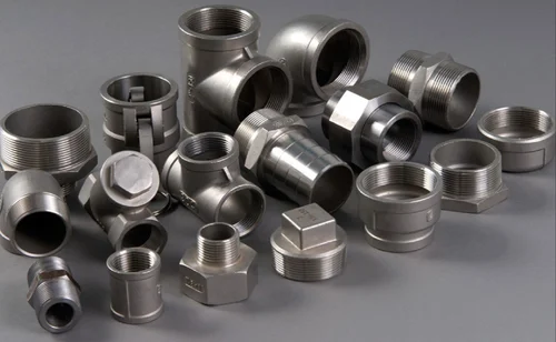 Forged pipe fittings and components